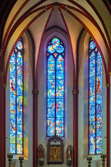 Fototapeta premium Mainz, Germany. Stained glass windows in the choir of Collegiate Church of St. Stephan. The church was built in 1267-1340.