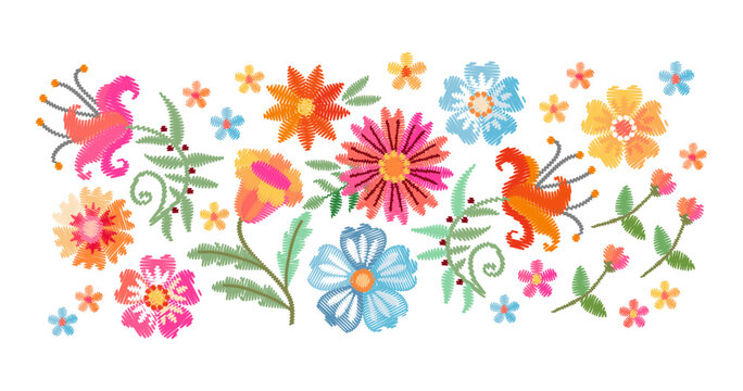 Cute composition with beautiful embroidered flowers on white background. Spring floral embroidery. 