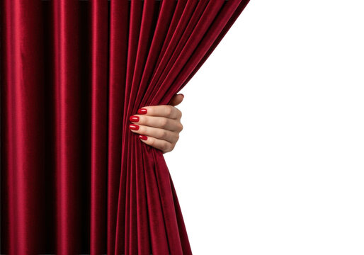 elegant woman's hand with glossy crimson nails forcefully pulling deep crimson velvet theatrical curtain, revealing transparent cyclorama studio setting. Concept of dramatic grand opening