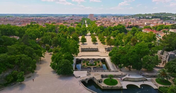 Aerial view of Nimes city with Roman amphitheater, travel in Nimes, France. Nimes Arena aerial panoramic view. Nimes is a city in the Occitanie region of southern France