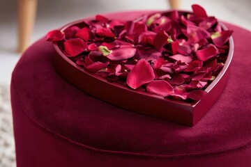 Heart-Shaped Red Petals on Velvet Cushion - Romantic Love Symbol.