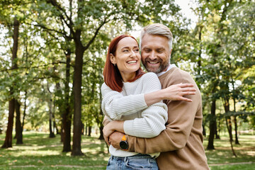 Naklejka premium Couple enjoys a romantic stroll through a vibrant spring park filled with greenery