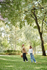 Couple enjoying a serene spring day together in a lush green park