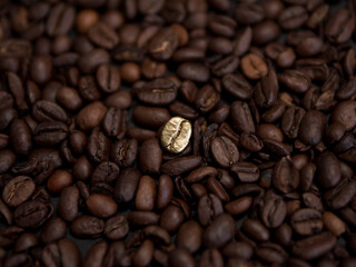 Fototapeta premium Golden Coffee Bean as Symbol of Luxury and Rising Value