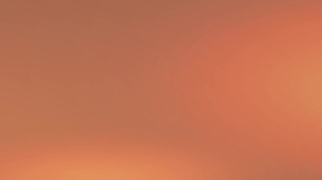 Soft Gradient of Color: A dreamy and abstract background, offering a gentle blend of warm, inviting hues creating a sense of tranquility and visual appeal.