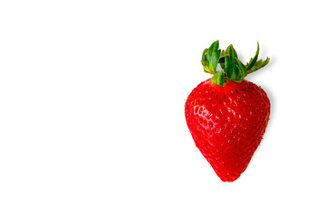 Single fresh strawberry with water drops on white background - Top view macro.