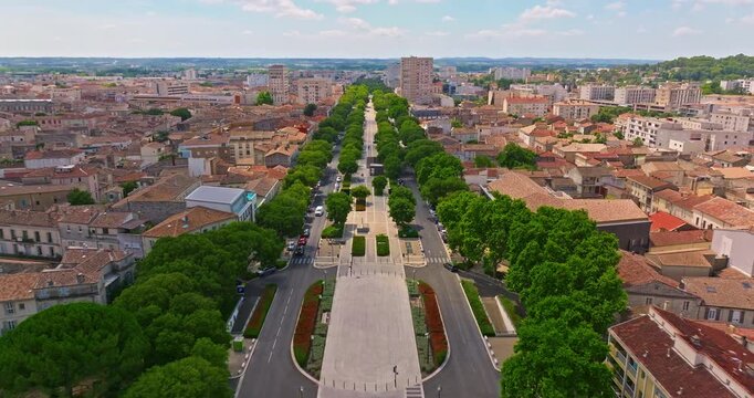 Aerial view of Nimes city with Roman amphitheater, travel in Nimes, France. Nimes Arena aerial panoramic view. Nimes is a city in the Occitanie region of southern France