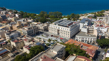 Obraz premium Aerial view of the building that houses the National Museum of Magna Graecia, located in Reggio Calabria, Italy. It is a National Archaeological Museum located in center, near the seafront of the city