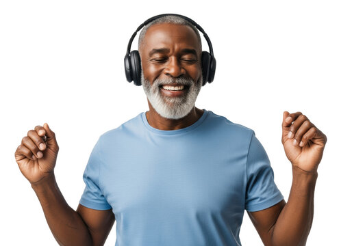 ecstatic senior african american man (65-75) in a blue t-shirt and wireless headphones, subtly dancing on a white studio background with copy space. concept of active lifestyle and audio enjoyment
