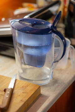 Brita Water Filter Pitcher on Kitchen Counter with Knife and Cutting Board