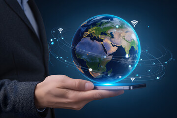 Businessman holding smartphone with glowing Earth globe and digital network lines representing global internet connectivity