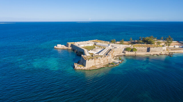 Aerial view of the Fortaleza de Sao Sebastiao, a stone fortress standing resolute against the azure sea, a testament to history, Nampula, Nampula Province, Mozambique.