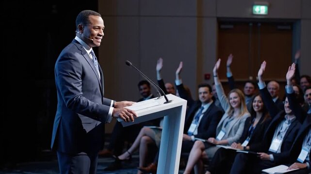 Corporate presenter engaging audience at skill development seminar in business