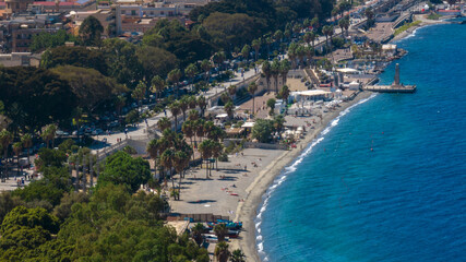 Fototapeta premium Aerial view of the waterfront of Reggio Calabria, southern Italy. The Falcomatà seafront overlooks the Mediterranean Sea and is known as the most beautiful kilometer in Italy. There is a urban beach.