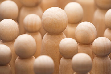 Large group of wooden people figurines