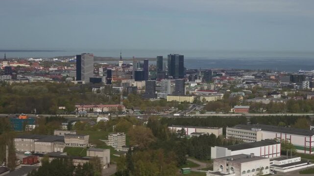 Tallinn city skyline with old town and skyscrapers.