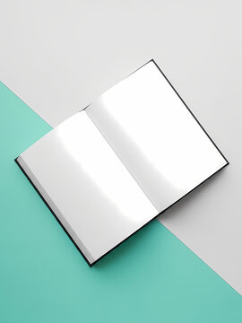 開いたノートの上に乗るさわやかな青色の背景でシンプルに書く