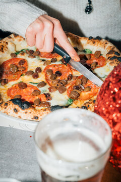 Tagliare una pizza