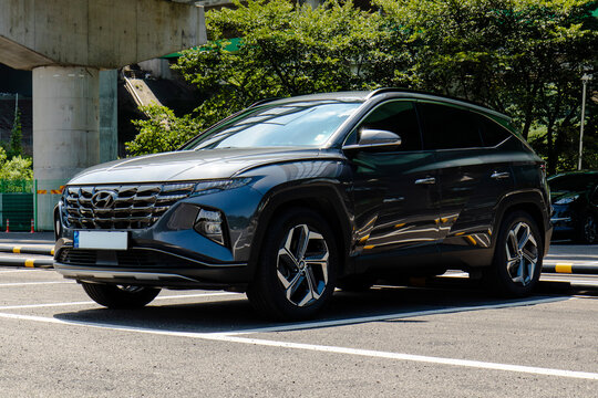 August 15, 2021, Seoul, South Korea - Dark gray Hyundai Tucson 1.6T SUV parked in an outdoor parking lot