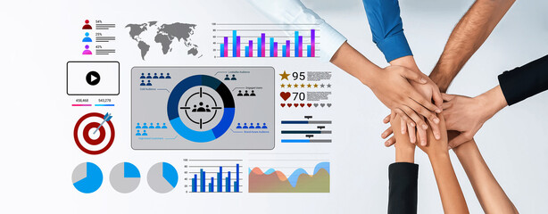 A diverse business team collaborates by analyzing crucial data, represented with charts and graphs. This image highlights effective teamwork for strategic planning and growth. Gantry