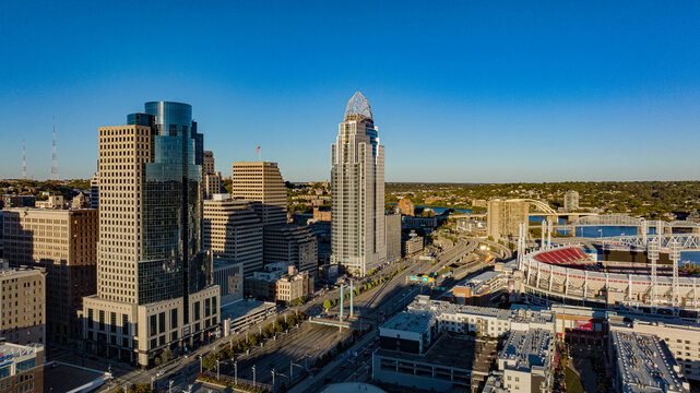 Aerial view of the towering Great American Tower and the Paycor Stadium, a vibrant contrast against the city's skyline, Cincinnati, Ohio, United States.