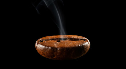 Steaming cup of coffee on dark background