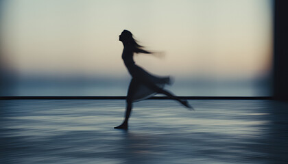 Blurred Motion of a Dancer in Silhouette with Soft Lighting