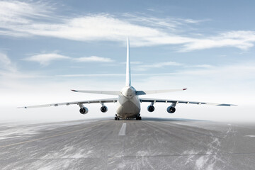 Rear view of the big cargo airplane isolated on bright background with sky