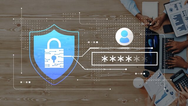 Digital security interface showing a padlock overlaid on a workspace with users, laptops, and data visualization elements for cybersecurity themes Gluon. - Powered by Adobe