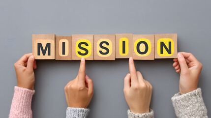 Corporate Mission Concept with Hands Pointing at Vision Statement