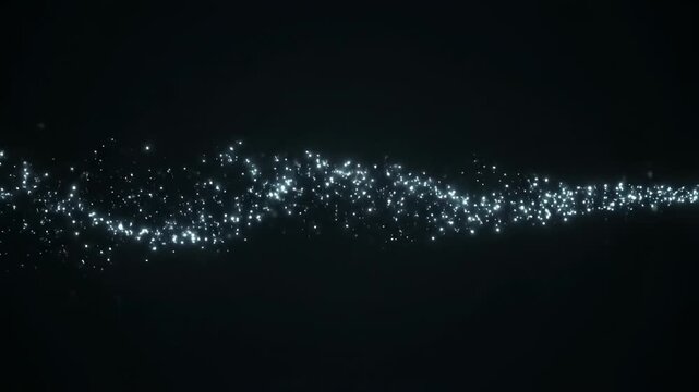 Glowing particles wave in the dark, captured from a front viewpoint in a video.