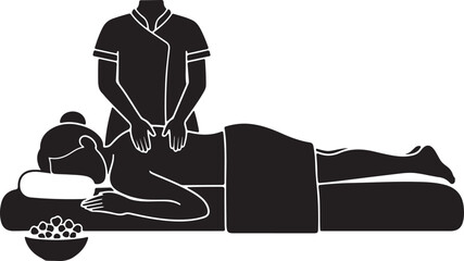 Massage therapist working on client's back