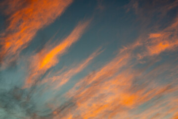Wispy Clouds Catch The Coral Light Of Sunset Over Big Bend
