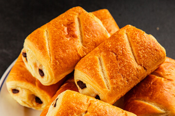 Chocolate bun pain au chocolate sweet pastry dessert food preparation tasty snack fresh delicious gourmet food background on the table rustic food top view copy space