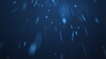 A dark blue background with streaks of light and blurry spots
