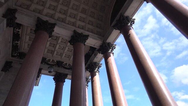 Huge granite Corinthian order columns hold the portico of the Saint Isaac's Cathedral 