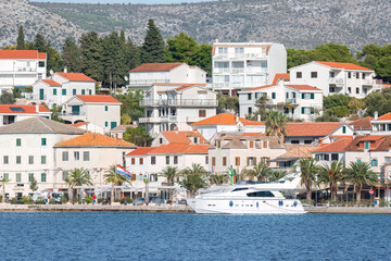 Rogoznica town waterfront with boats and traditional buildings. Croatia