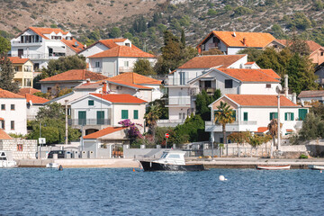 Rogoznica coastal village with boats moored in calm Adriatic Sea. Croatia