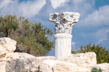 Kourion ancient Corinthian column capital carving against sky. Limassol District, Cyprus