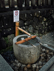 japanese shrine water purification bamboo