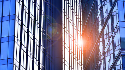 Modern office building exterior made from glass and steel. Windows of office building. Abstract...