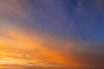 Fototapeta premium Beautiful multi-colored sunset with different colors and clouds as the sun sets over the horizon, sunset or sunrise