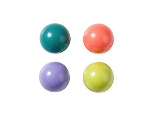 Four colorful plastic pit balls against transparent background