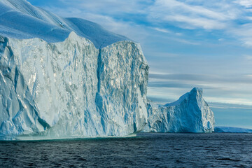 Massive Iceberg Wall During Midnight Sun in Disco Bay Near Ilulissat, Greenland, Arctic © Katrin
