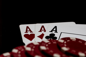 Obraz premium Winning poker hands with playing cards on a dark background for casino and entertainment games