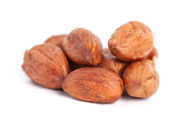 Hazelnuts kernels on a white background, healthy food. Macro