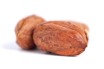 Hazelnuts kernels on a white background, healthy food. Macro