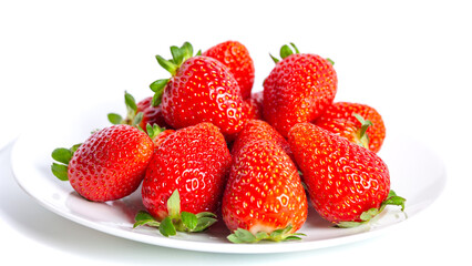 Ripe strawberries on a white plate, isolated on a white background