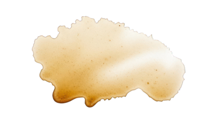 Isolated light brown coffee stain with textured edges, against a pure black background