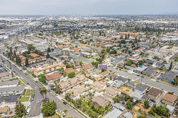 Buena Park, California – May 30, 2024: Aerial Drone City View Photo toward Beach Blvd, Freeway 5 Five, Commonwealth Ave, City of Buena Park, The Source OC with Commercial Buildings, Home, Town, Street